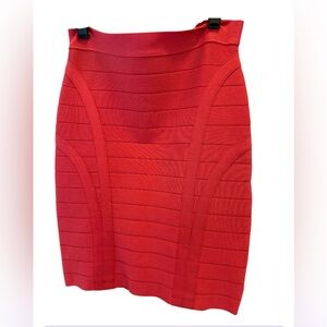 Bebe coral red woman’s body con skirt.  Size small.